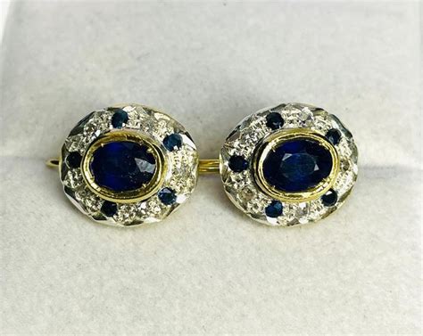 14 Kt Silver Yellow Gold Earrings 200 Ct Sapphires Catawiki