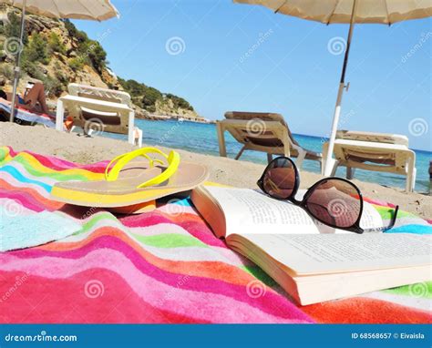 Flip Flops Sunglasses And Book On The Beach Stock Image Image Of Lounge Nature 68568657