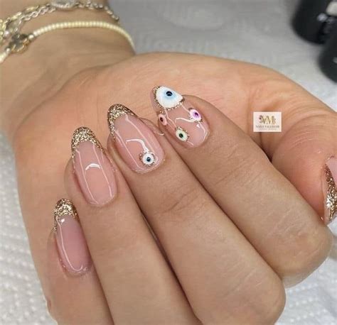 Uñas con ojo turco diseños místicos y originales para lucir tus uñas