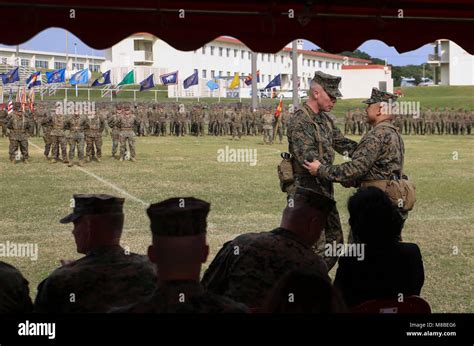 Sgt Maj Vincent Santiago Right And Sgt Maj Dennis Bradley Embrace