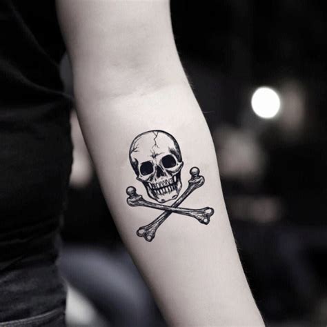 Girly Skull And Crossbones Tattoos