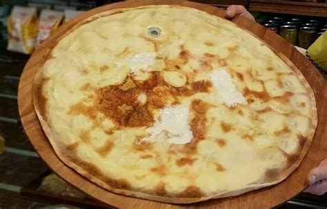 Focaccia Di Recco Col Formaggio In Panificio Moltedo Tasteatlas