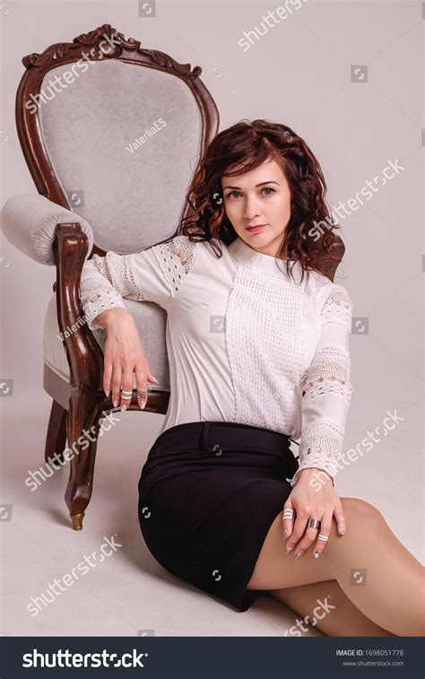 Sexy Curly Brunette Leaned On Beautiful Stock Photo 1698051778 Shutterstock