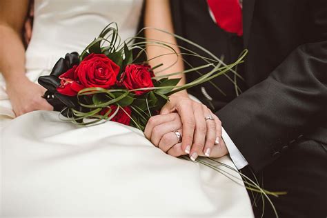 HD wallpaper: man holding red flowers, couple holding hands together ...