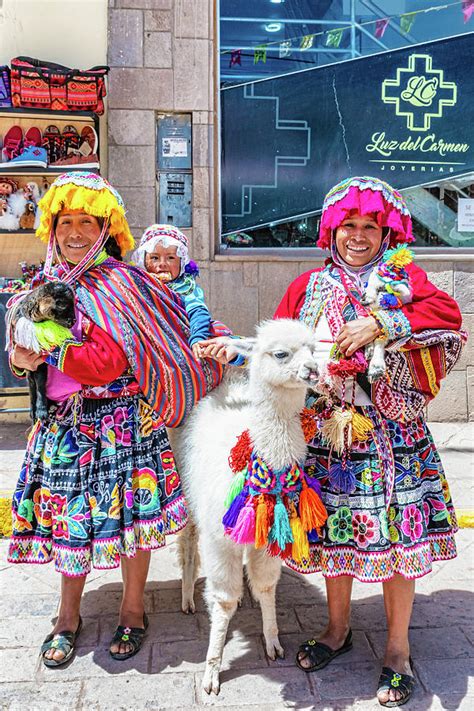 Alpaca And Women In Traditional Clothes In Pisaq Peru Photograph By