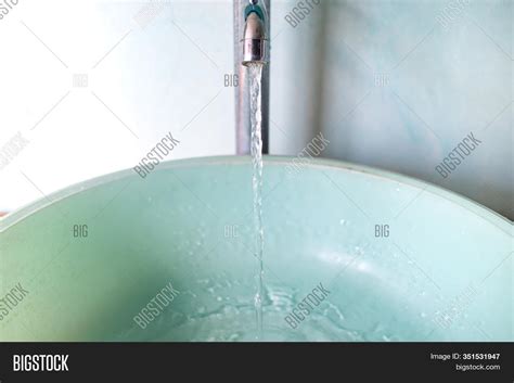 Water Flowing Faucet Image And Photo Free Trial Bigstock