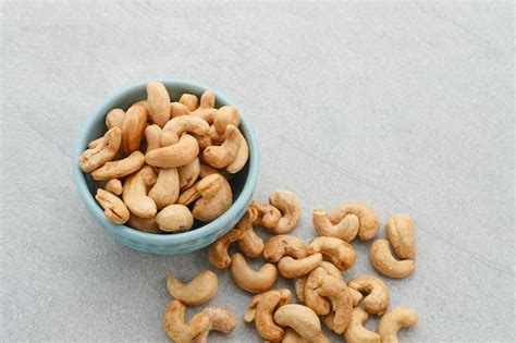 Free Photo Raw Cashews Nuts In Bowl On Dark Background