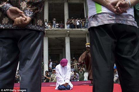 Indonesian Women Wait To Be Whipped In Front Of A Baying Crowd For Having Unmarried Sex Daily