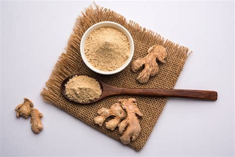 Premium Photo Ginger Or Adrak Powder With Dried Whole Also Known As Sunth Or Sonth In India