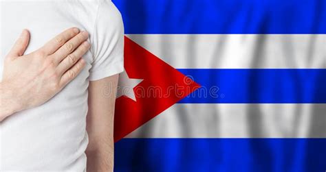 Cuban Person with Hand on Heart on the Background of Cuba Flag ...