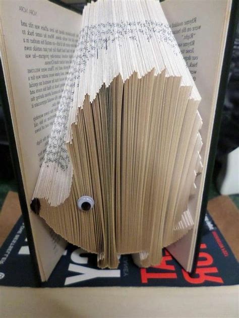 An Open Book With A Face Made Out Of Pages