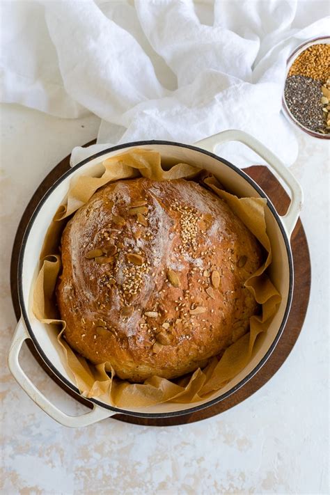 No Knead 4 Seed Dutch Oven Bread Nourish And Fete