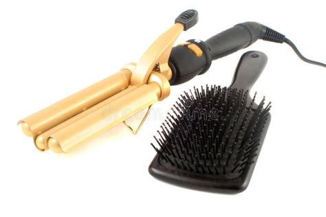 Curling iron and brush stock image. Image of hairbrush - 7593349