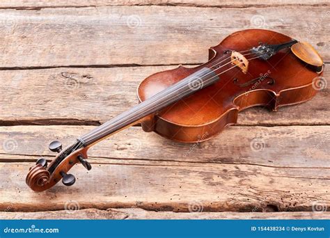 Old Violin On Wooden Floor Stock Photo Image Of Background Fiddle