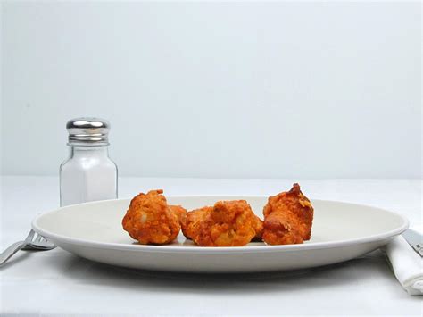 Calories in 4 piece(s) of Buffalo Wings - Frozen.