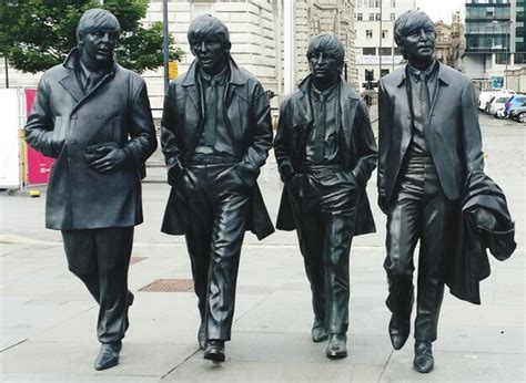 Premium Photo The Beatles Statue At Pier Head Liverpool