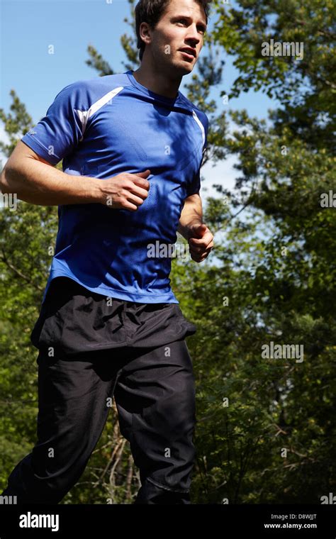 Man Jogging In Park Stock Photo Alamy