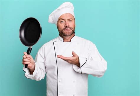 Premium Photo Middle Age Man Chef Concept With A Fry Pan Sport Coach