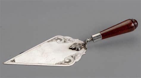 A SILVER PRESENTATION TROWEL IMPRESSED STERLING SILVER