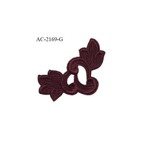 Guipure décor ornement spécial lingerie haut de gamme motif à coudre couleur prune tirant sur le
