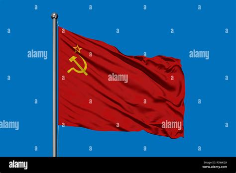 Flag Of Soviet Union Waving In The Wind Against Deep Blue Sky USSR