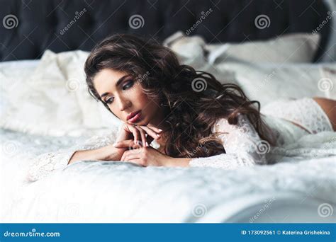 Woman Posing On Bed In White Lingerie Stock Image Image Of Dark