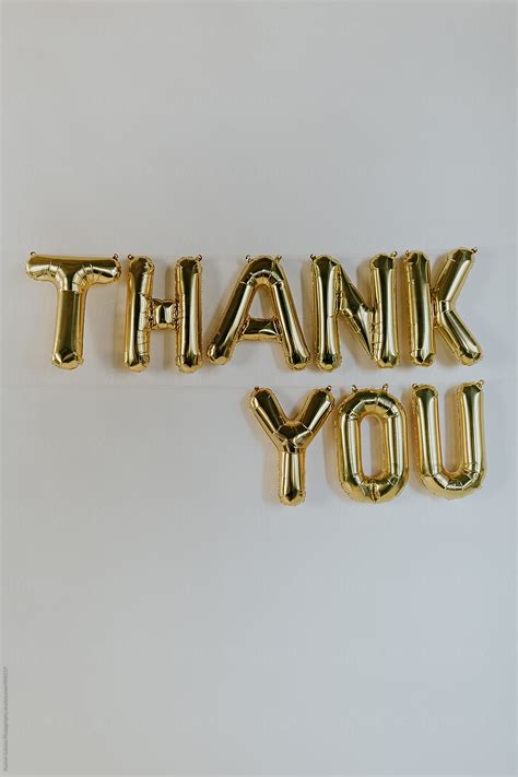 Gold Thank You Balloon Letters by Rachel Gulotta Photography - Stocksy United