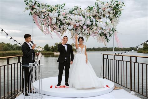 Premium Photo | Wedding ceremony of the newlyweds on the pier