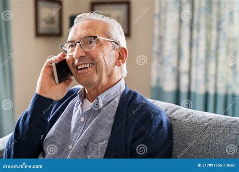 Happy Carefree Old Man Talking Over Phone Stock Photo Image Of Couch