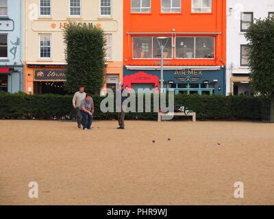 Members of the Liberation Petanque Club playing petanque on a public ...