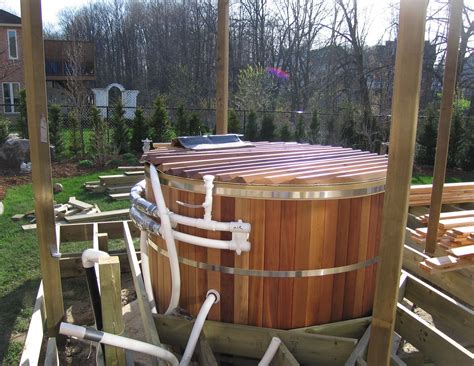 The Decking Around A Cedar Hot Tub Has Many Different Functions It Is A Place To Sit A Place