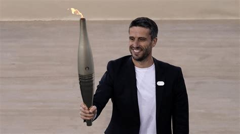 Greece Hands Olympic Flame To Paris Games Organisers Revolution Gr