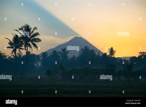 Sun Rising Over Mount Merapi Volcano Central Java Indonesia Stock Photo