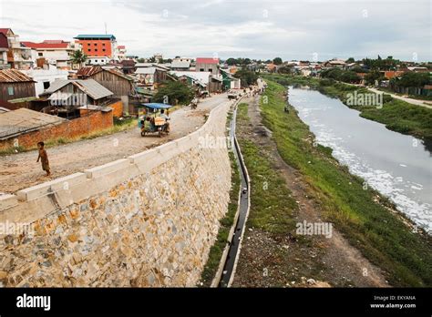 Cambodia, River running through slums; Phnom Penh Stock Photo - Alamy