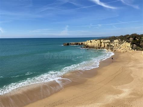 Walking Along The Cliffs And Beach Of Praia Da Coelha And Praia Do