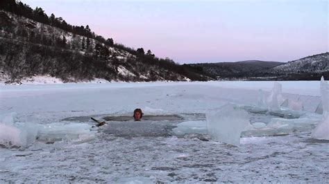 Wim Hof Method: ice hole swimming in Lapland - YouTube