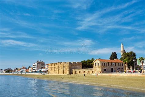 The Busy Finikoudes Beach Next To The Old Castle In The City Centre