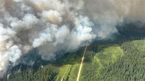 'Wall of flames' from out-of-control Canadian wildfire devastates town ...