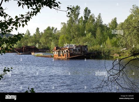 A Sunken Industrial Ship Decays Slowly On The Pripyat River Inside The