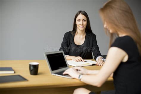 Young Women Working in the Office Stock Image - Image of hair, pencil ...