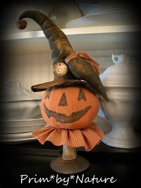 An Image Of A Pumpkin With A Hat On It S Head And The Caption Prim By Nature Primitive Halloween