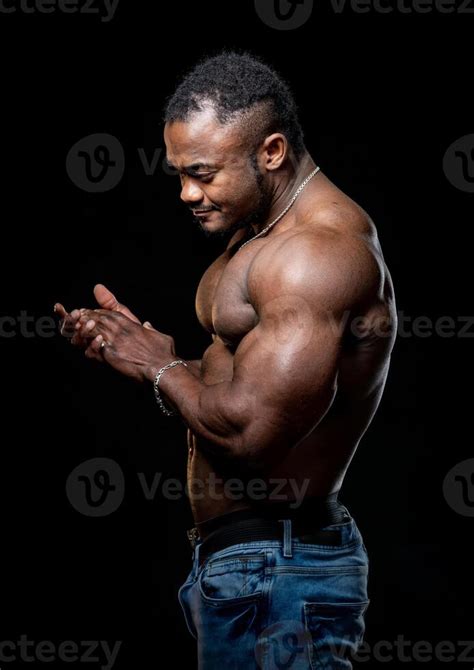 Handsome Muscular Man With Naked Torso Sitting On Chair Athletic Fitness Male Posing For Camera