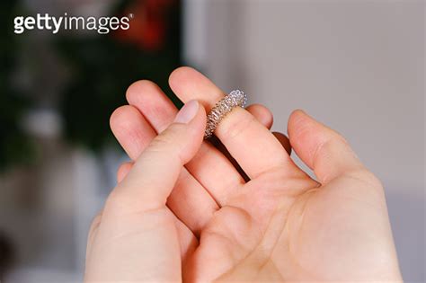 Massage Ring For Fingers In Female Hands Close Up Su Jok Therapy