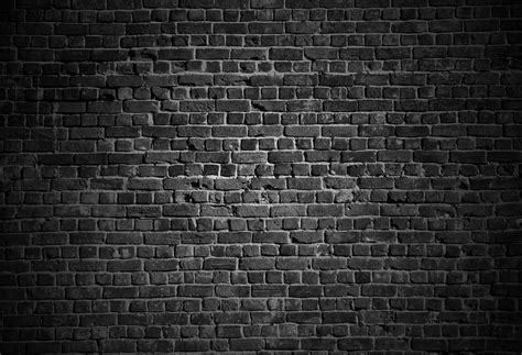 Pared De Ladrillo Oscura Textura De Un Fondo Negro Del Ladrillo Foto