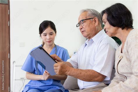 Nursing Home Care concept. The staff explained to the elderly who ...