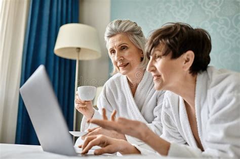 A Loving Senior Lesbian Couple Sits Stock Photo Image Of Loving Leisure