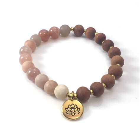 Sandalwood And Sunstone Gold Lotus Stretch Bracelet By