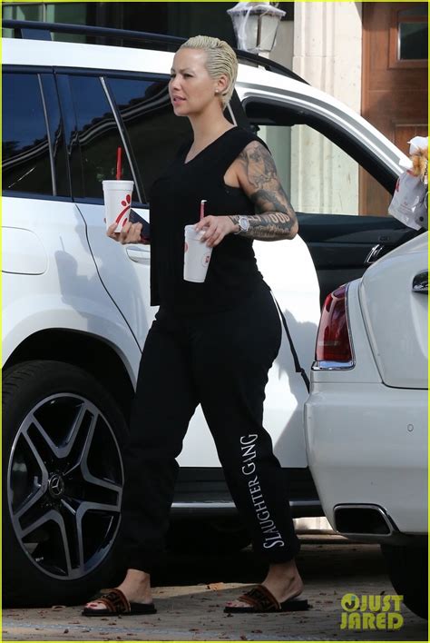 Amber Rose Emerges After Breast Reduction Surgery Photos Photo