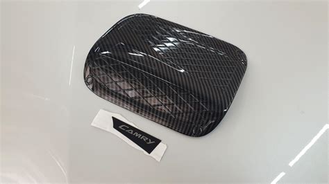 Накладка на лючок бензобака Camry V70 карбон