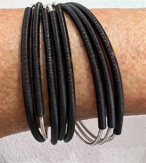 8-Strand Piano Wire Bracelet wrapped in Black – Dem Two Hands